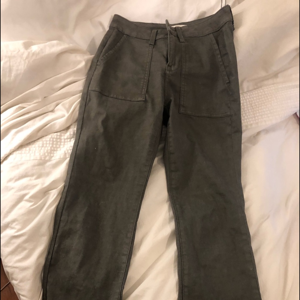 Army green pants with a mini semi flare at the bottom